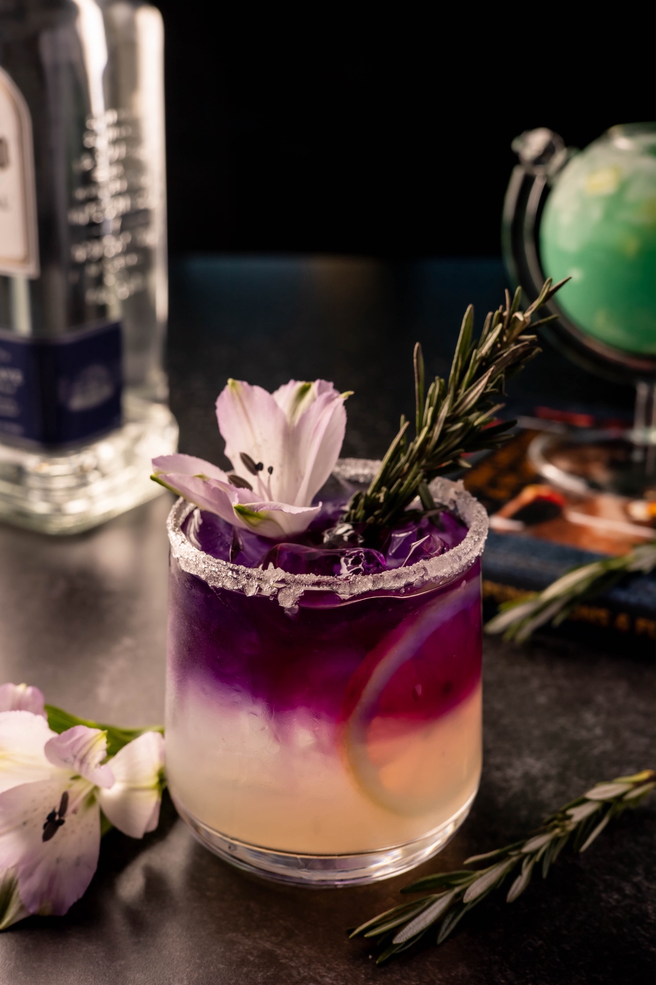 A floral purple and citrus cocktail at the Aruna bar